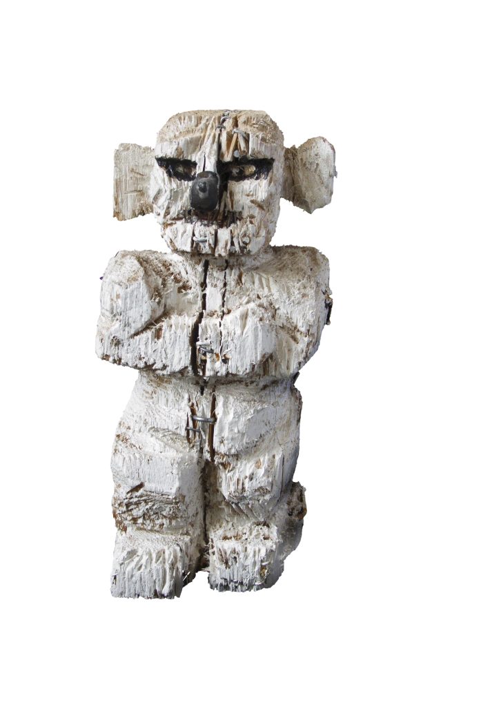 Grob behauene Holzfigur als Symbol für Trauer und Verlust in der Trauerbegleitung Basel.